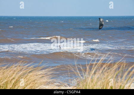 Kite surfing at Sea Palling on the Norfolk Coast Stock Photo