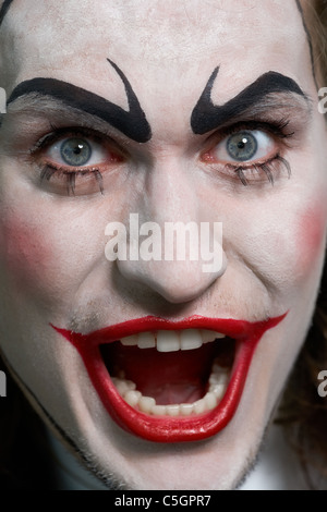 Close-up of male face with theatrical makeup Stock Photo