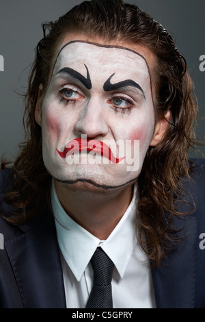 Close-up of dramatist with theatrical makeup in formalwear Stock Photo