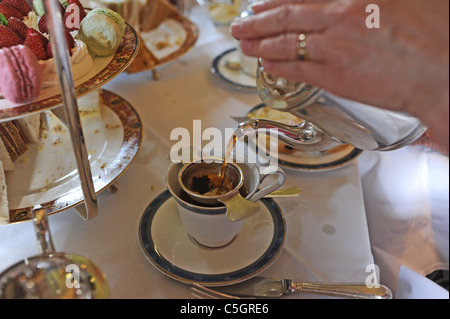 Afternoon tea and cakes at Amberley Castle hotel and restaurant near Arundel West Sussex UK Stock Photo