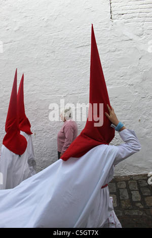 Penitents With Red Hoods In Easter Procession In Northern Spain Stock 