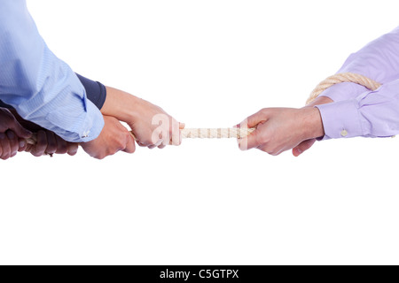 Group of woman hands pulling a rope competing with a man (selective focus) Stock Photo