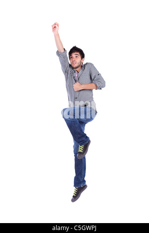 Young man jumping isolated on white (some motion blur) Stock Photo