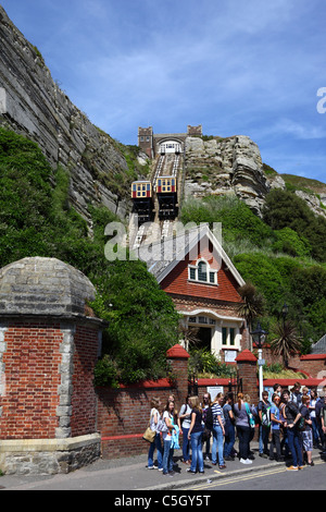 School group outside station building waiting to use the East Hill Lift funicular railway, Rock-A-Nore Road, Hastings, East Sussex, England Stock Photo