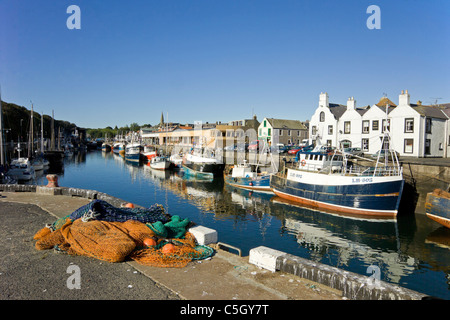 Fishing boats in harbour at Eyemouth Stock Photo