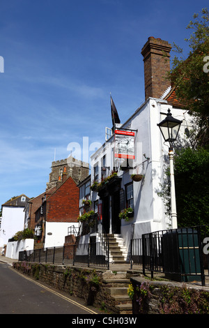 The Stag Inn, All Saints Street and All Saints church in the Old Town, Hastings, East Sussex, England Stock Photo