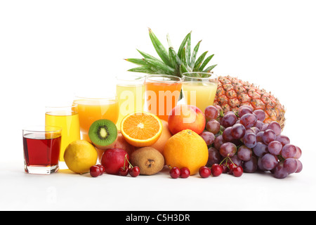 Glasses of fruit juice with fruits on a white background Stock Photo