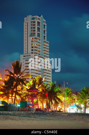 High-rise hotel on the tropical coast of southern sea Stock Photo