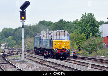 Two Direct Rail Services class 47 diesel locomotives approaching Leamington Spa station, UK