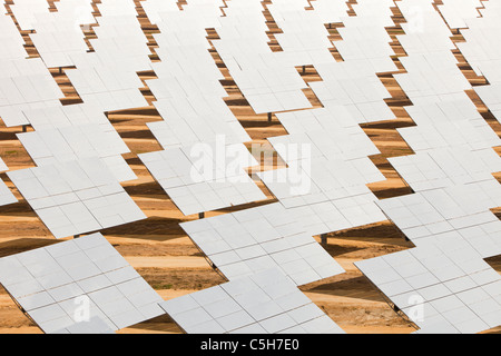 Heliostats, large reflective mirrors directing sunlight to the PS20 solar thermal tower, the only such working solar tower curre Stock Photo