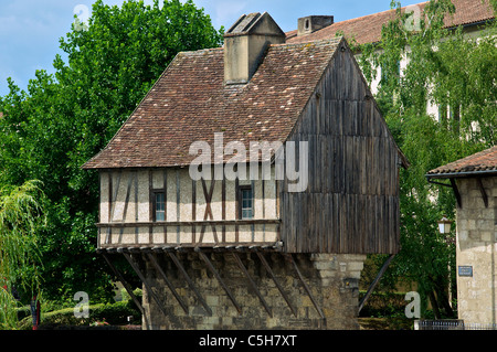 Unusual house built on old stone wall Perigueux Aquitaine France Stock Photo