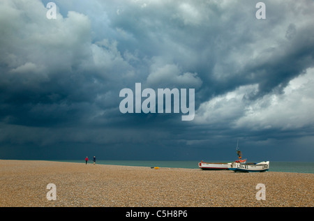 Cley beach towards Blakeney Point Norfolk and coming storm Stock Photo