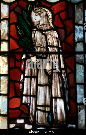 Section of stained glass depicting St.Agnes the patron Saint of young girls due to her chastity and refusal to marry. Stock Photo