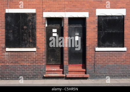 Boarded up houses near Potteries factory in Middleport, Stoke-on-Trent, Staffordshire, England. Stock Photo