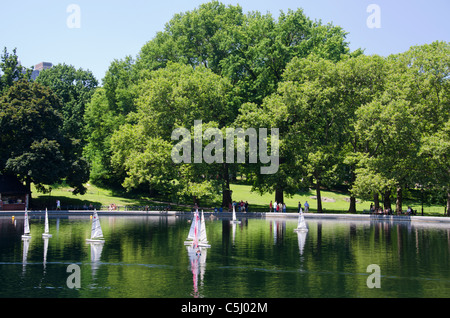 New York, New York City, Central Park. Remote control toy sail boats on Central Park lake. Stock Photo