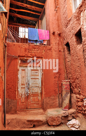 Abyaneh is a famous historic Iranian village near the city of Natanz in Isfahan, Iran characterized by a peculiar reddish hue. Stock Photo