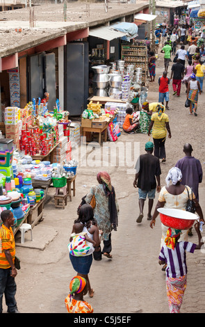 Busy market street with household product stalls, Kaneshie Market, Accra, Ghana Stock Photo