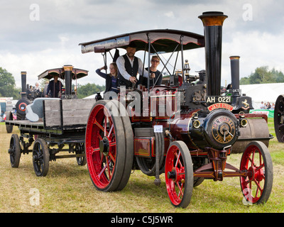 Traction engine towing trailer at Woodcote Vintage Steam Rally, Woodcote, Reading, Berkshire, England Stock Photo