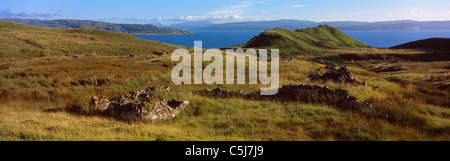 The ruined and abandoned village of Bourblaige in Ardnamurchan, western Scotland, looking across the Sound of Mull to the Stock Photo