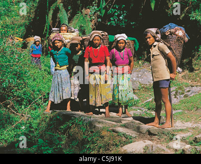 Group Of Youngsters On A Trading Trip Carrying Goods Back To Their Home Village In The Makalu Region Of East Nepal Nepal Makalu Barun National Park Stock Photo Alamy