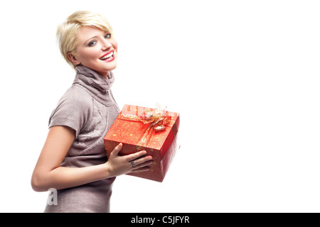 Smiling woman with gift Stock Photo