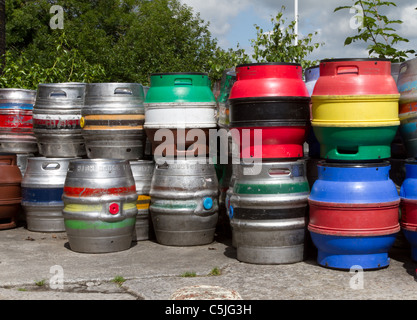 stack of vibrant multicoloured beer kegs. Stock Photo