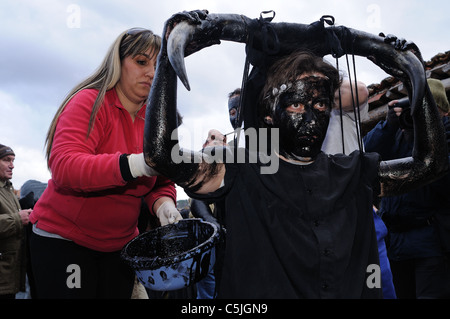 ' Devils Luzón ' Preparing for Carnival in LUZON. Guadalajara . Castille - La Mancha . SPAIN Stock Photo