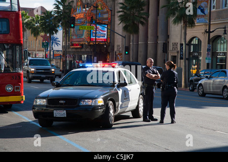 LAPD Police car with lights flashing in Hollywood, Los Angeles, California, USA Stock Photo