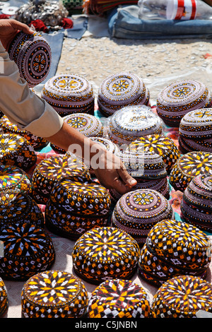 Turkmenistan - Ashgabat - Sunday market stall selling traditional hats Stock Photo