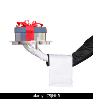 A waiter holding a silver tray with a gift on it Stock Photo