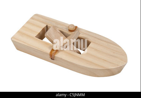 Rubberband powered wooden paddle boat - path included Stock Photo