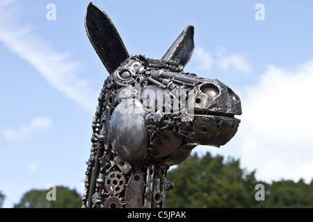 Metal statue of horse, metal welded animal wildlife sculpture african art, made from recycled materials,  at the RHS Royal Horticultural Show Tatton Park, Cheshire, July 2011. Stock Photo