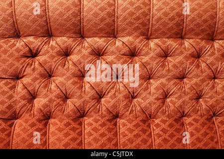 Bright red antique furniture upholstery - the background Stock Photo