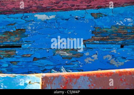 An old traditional Greek fishing boat on the beach at Skala Eresou, Lesbos, Greece. Stock Photo