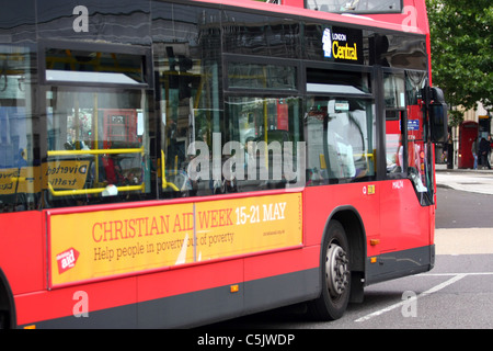 The front part of a bendy bus traveling in London Stock Photo