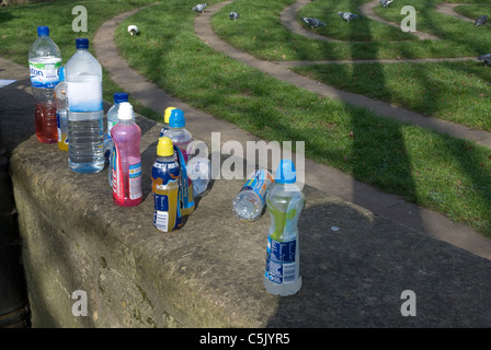 Empty bottles left on a wall from Bath Half Marathon, Bath Somerset UK Stock Photo