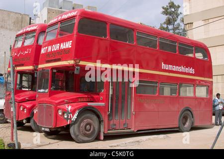 Double decker London buses of Joe Letts and peace activist Ube Evans carrying human shields to Baghdad, Iraq, in Beirut, Lebanon Stock Photo