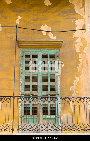 Wooden green window shutters of an old building, Beirut, Lebanon Stock Photo