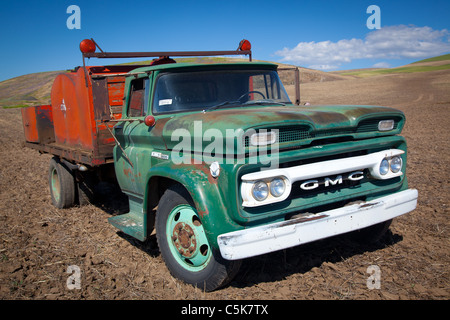 Old truck in Palouse farm field Stock Photo