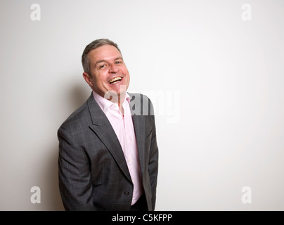 Businessman laughing - studio shot Stock Photo