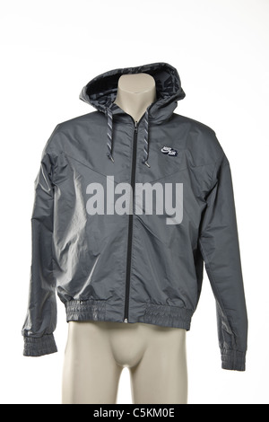 Nike Air men's windrunner sportswear rain jacket. Reversible black with detail one side, grey the other. Nylon full zip jacket. Stock Photo