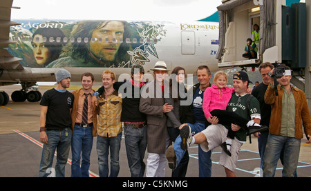 Stars of Lord of the Rings movies lined up for farewell photo-opportunity in front of specially painted airliner at Wellington Stock Photo