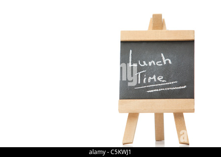 Chalkboard with the words lunch time written on it Stock Photo