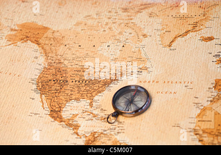 World map with compass showing North America Stock Photo