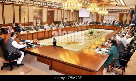 Prime Minister, Syed Yousuf Raza Gilani addresses the first session of Dialogue with intellectuals at PM Secretariat Stock Photo