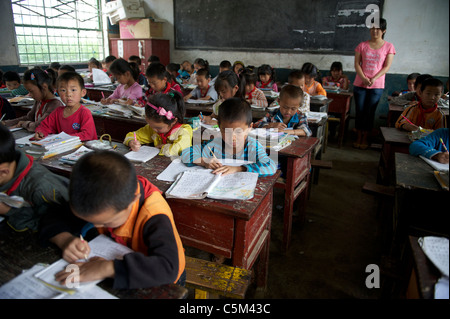 Chinese primary school students attending class at a poor village in Shangluo, Shaanxi province, China. 21-May-2011 Stock Photo