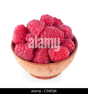 Wooden bowl full of fresh raspberry isolated on white background Stock Photo