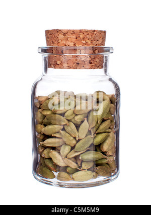 glass bottle full of cardamom isolated on white background Stock Photo