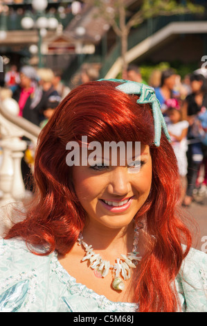 A beautiful girl character from the parade at Disneyland Paris in France Stock Photo