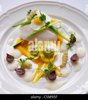 Confit Fillet of Turbot with mushroom tortellini & baby Leeks Stock Photo